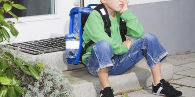 Jupiterimages/Creatas/Getty Images A child prone to negative thinking assumes every day will be a bad day.