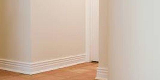 Jupiterimages/Comstock/Getty Images Tile installations have specific procedures that protect the structural integrity.