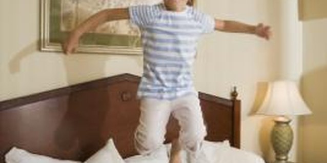 Comstock Images/Stockbyte/Getty Images With kids bouncing around the home, well-secured objects are imperative.