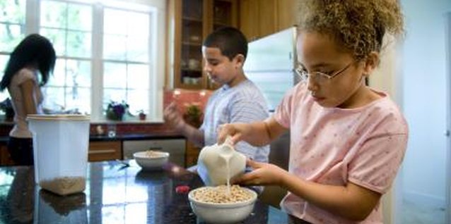 David Sacks/Lifesize/Getty Images Fortified breakfast cereals give your kids a healthy portion of their daily zinc.