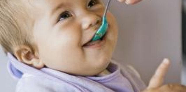 Dynamic Graphics/Creatas/Getty Images Rice cereal poses several health risks to infants.