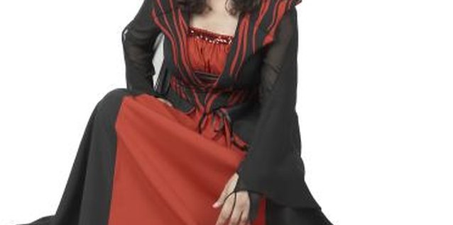 Photos.com/PhotoObjects.net/Getty Images Many teens enjoy dressing in spooky costumes to surprise trick-or-treaters.