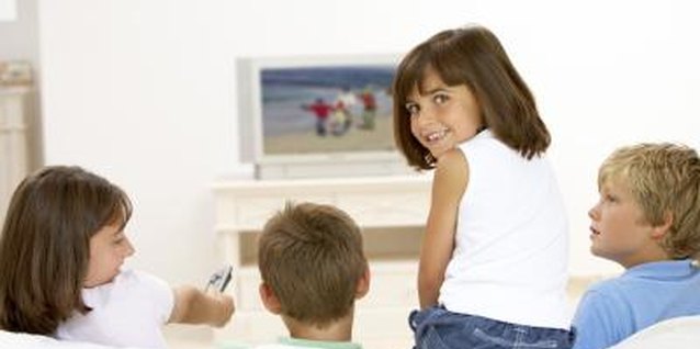 BananaStock/BananaStock/Getty Images Some children have trouble distinguishing between their TV programs and advertising, which tries to capture their attention.
