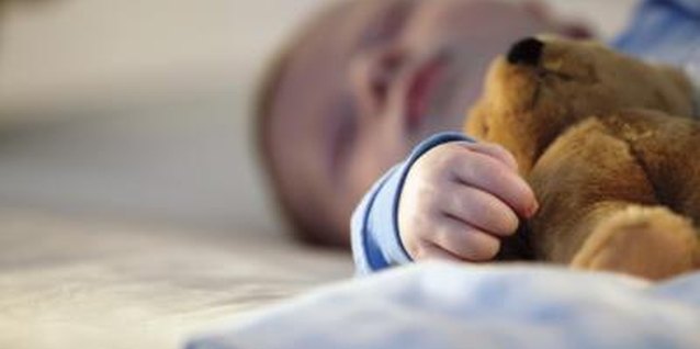 Comstock/Comstock/Getty Images A transitional object, such as a stuffed animal, may ease sleeping angst.