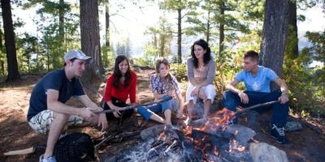 Jupiterimages/Photos.com/Getty Images A camping-themed party lets teens relax and celebrate.