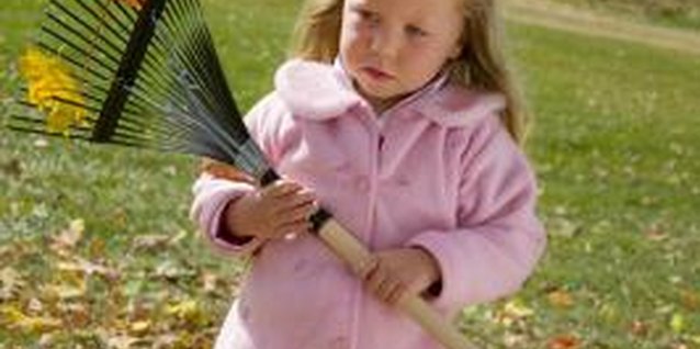 Jupiterimages/liquidlibrary/Getty Images Providing a service is just one way to teach a child how to love her neighbor.