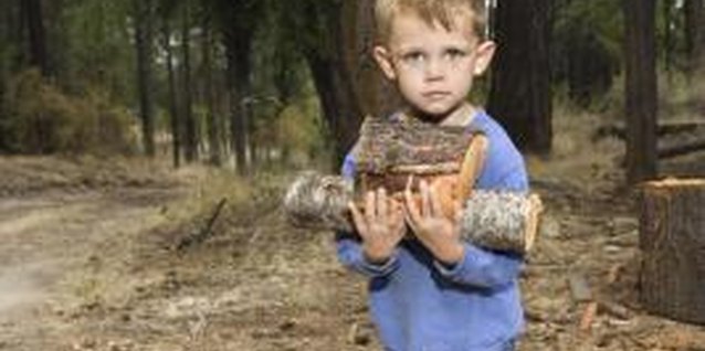 Jupiterimages/Comstock/Getty Images Involve your toddler in camping preparations.
