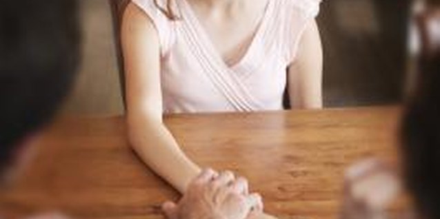 Jupiterimages/Brand X Pictures/Getty Images Punishing your teen isn't easy.
