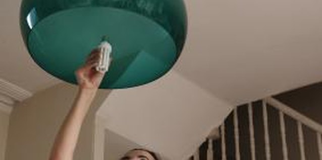 Andrew Hobbs/Photodisc/Getty Images This translucent shade will cast various shades of green onto the ceiling when the light is turned on.