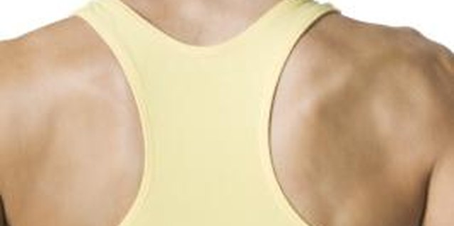 Digital Vision/Photodisc/Getty Images Sculpt a sleek, strong back with seated rows.