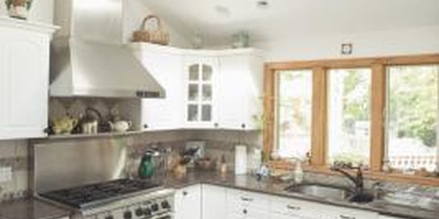 Thinkstock Images/Comstock/Getty Images Putting your recessed lights on a dimmer allows you to control atmosphere.