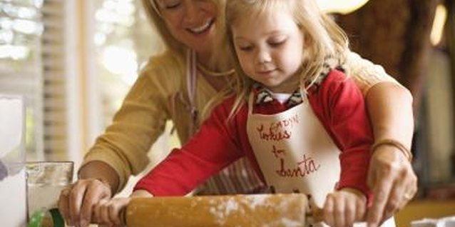 Jupiterimages/Brand X Pictures/Getty Images Make dove-shaped cookies with your tot for the 12 Days of Christmas.