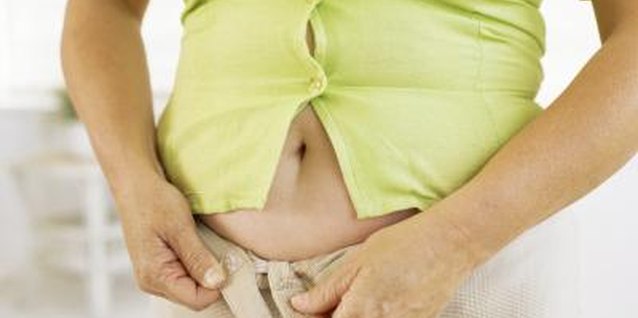 Stockbyte/Stockbyte/Getty Images Middle-age spread is not inevitable with a healthy lifestyle.