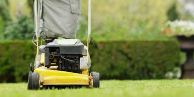 Stockbyte/Stockbyte/Getty Images Check for loose wheels if the lawn mower becomes hard to control.
