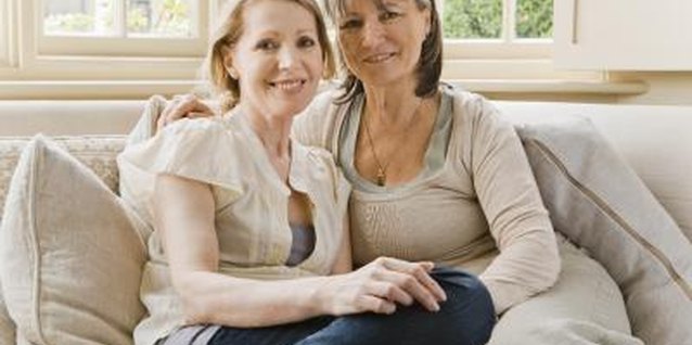 Jupiterimages/Pixland/Getty Images Your support could dissuade your friend from having an affair.