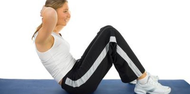 Jupiterimages/Photos.com/Getty Images The ab sit-up mainly targets the abs while also engaging muscles in the hips.