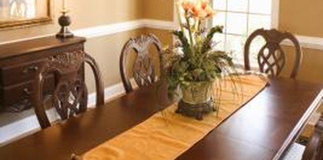 Thinkstock Images/Comstock/Getty Images Wall color changes the character of a dining room.