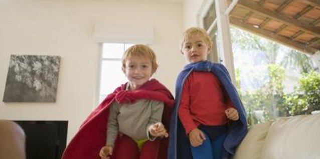 Jupiterimages/BananaStock/Getty Images Homemade super hero costumes keep kids busy.