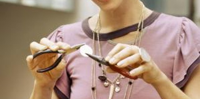 Stockbyte/Stockbyte/Getty Images Teenagers can make a variety of simple instruments at home.