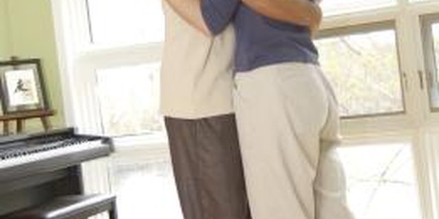 Hemera Technologies/AbleStock.com/Getty Images Long hugs have a way of making your feel connected.