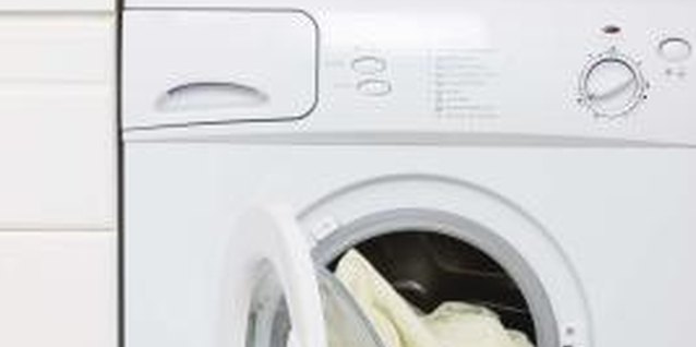 Jupiterimages/Polka Dot/Getty Images Read fabric care labels before adding any detergents or heat products.