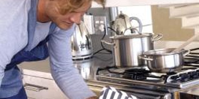 Pixland/Pixland/Getty Images Use a baking dish to cook salmon or chicken in the oven.