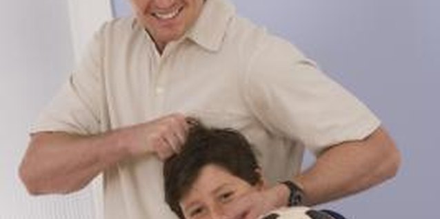 Comstock Images/Comstock/Getty Images Noogies may hurt more than your kid's head.
