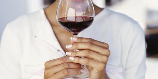Stockbyte/Stockbyte/Getty Images The age of a wine affects the weight of its tannin and flavors.