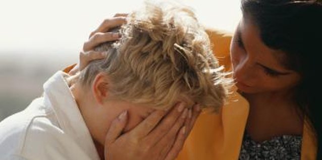 David De Lossy/Photodisc/Getty Images Offering to listen to stories about your friend's lost loved one can be one way to show condolences.