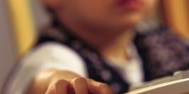 Comstock/Comstock/Getty Images Your computer may actually pose a choking threat to your child.