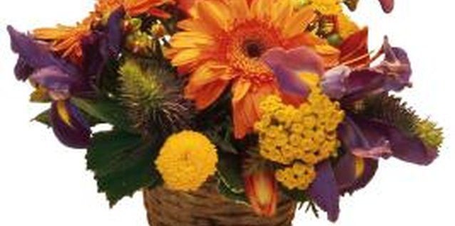 Comstock/Comstock/Getty Images A fall floral basket spices up your table.