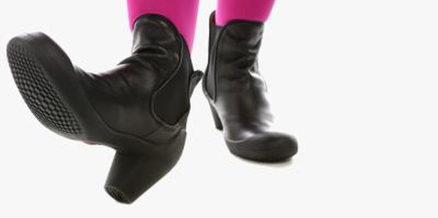 Brand X Pictures/Brand X Pictures/Getty Images Keep your leather boots and other footwear alive and kicking with mink oil or shoe polish.