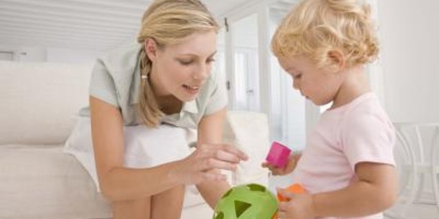 Jupiterimages/Goodshoot/Getty Images Talking to your toddler throughout the day will build vocabulary and facilitate language development.