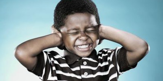 Aidon/Stockbyte/Getty Images He pretends not to hear you, so get him to listen up.