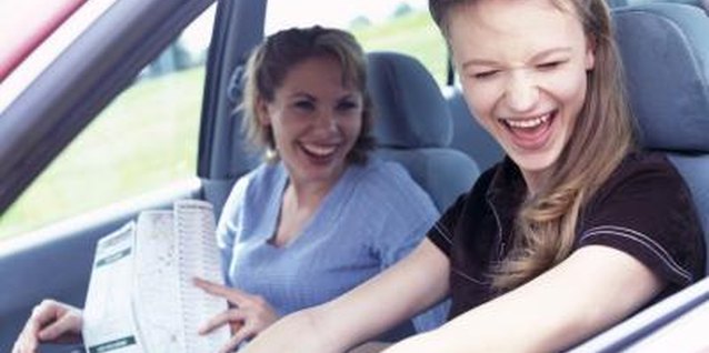 Creatas/Creatas/Getty Images The benefits might outweigh the disadvantages of teens driving to school.