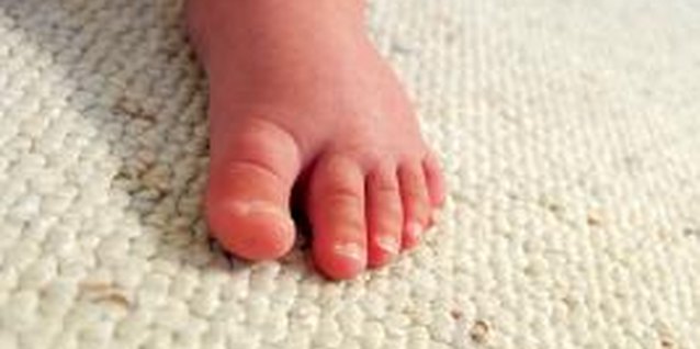 Thinkstock/Comstock/Getty Images Carpet -- ugly or not -- provides a soft surface under delicate knees and tender toes.