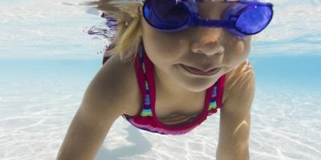 Photodisc/Photodisc/Getty Images Some kids really do take to the water like little fish.