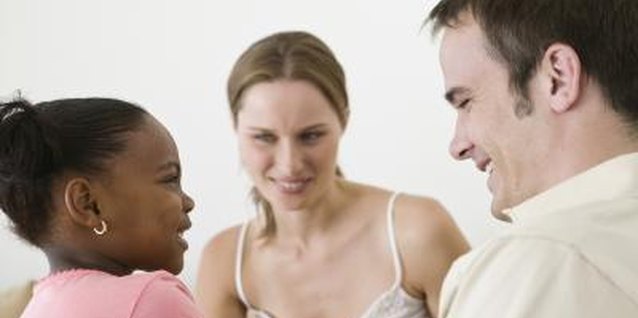 Jupiterimages/Pixland/Getty Images Adoption awareness is an important lesson to teach little ones.