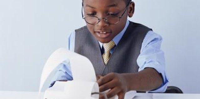 Digital Vision/Photodisc/Getty Images Help your young accountant learn to budget and save.