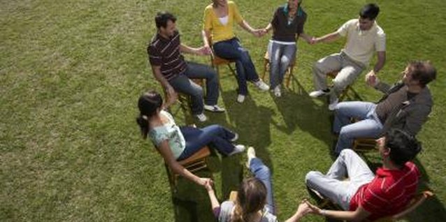 Paul Sutherland/Digital Vision/Getty Images Attending a support group with other spouses of addicts can help you cope with a difficult situation.