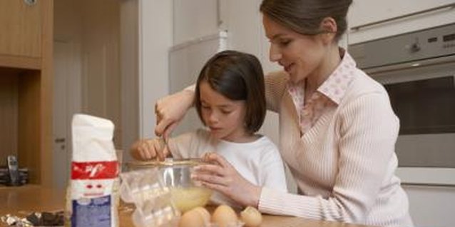 Rayes/Photodisc/Getty Images Simple ingredient substitutions help you achieve a boxed cake that's lower in fat.