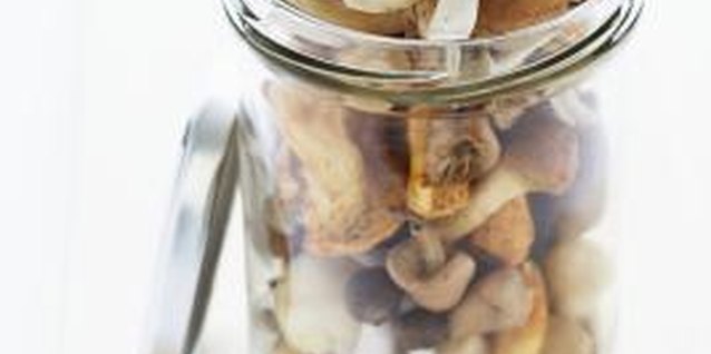 Martin Poole/Digital Vision/Getty Images Add fresh mushrooms to canned soup for more flavor.