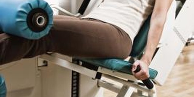 Jupiterimages/Brand X Pictures/Getty Images The leg extension hits the quads without engaging too many other leg muscles.