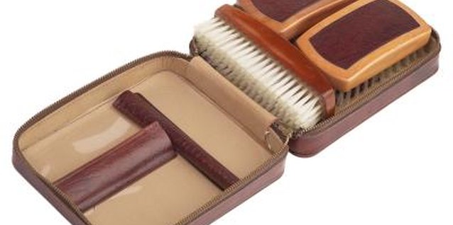 Hemera Technologies/PhotoObjects.net/Getty Images Keep a shoe shine handy in your shoe organizer or closet.