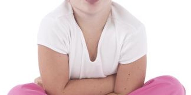 Hemera Technologies/PhotoObjects.net/Getty Images Moms need to differentiate childish mistakes from defiant behavior.