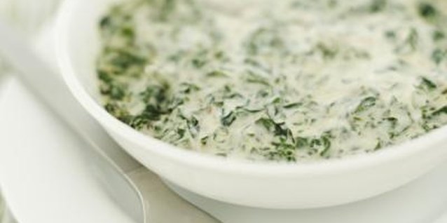 George Doyle/Stockbyte/Getty Images Serve creamed spinach warm for best flavor.