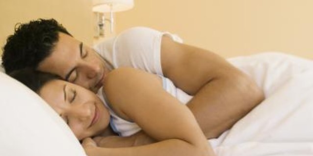 Brand X Pictures/Brand X Pictures/Getty Images Cuddling is an important part of combatibility.
