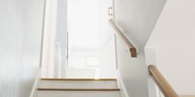 Thinkstock Images/Comstock/Getty Images Stenciling a detailed pattern on your stair treads and/or risers can instantly dress up a plain staircase.