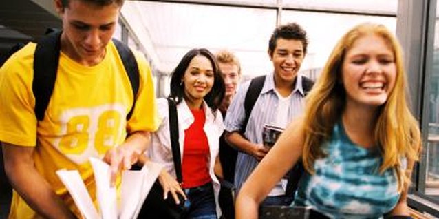 George Doyle/Stockbyte/Getty Images Smiling at your shy crush in the hallway is the first step to befriending him.
