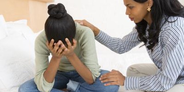 Jupiterimages/Creatas/Getty Images Sad teenagers might feel depressed.